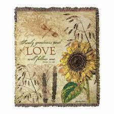 Decorative blanket with a sunflower and the word LOVE