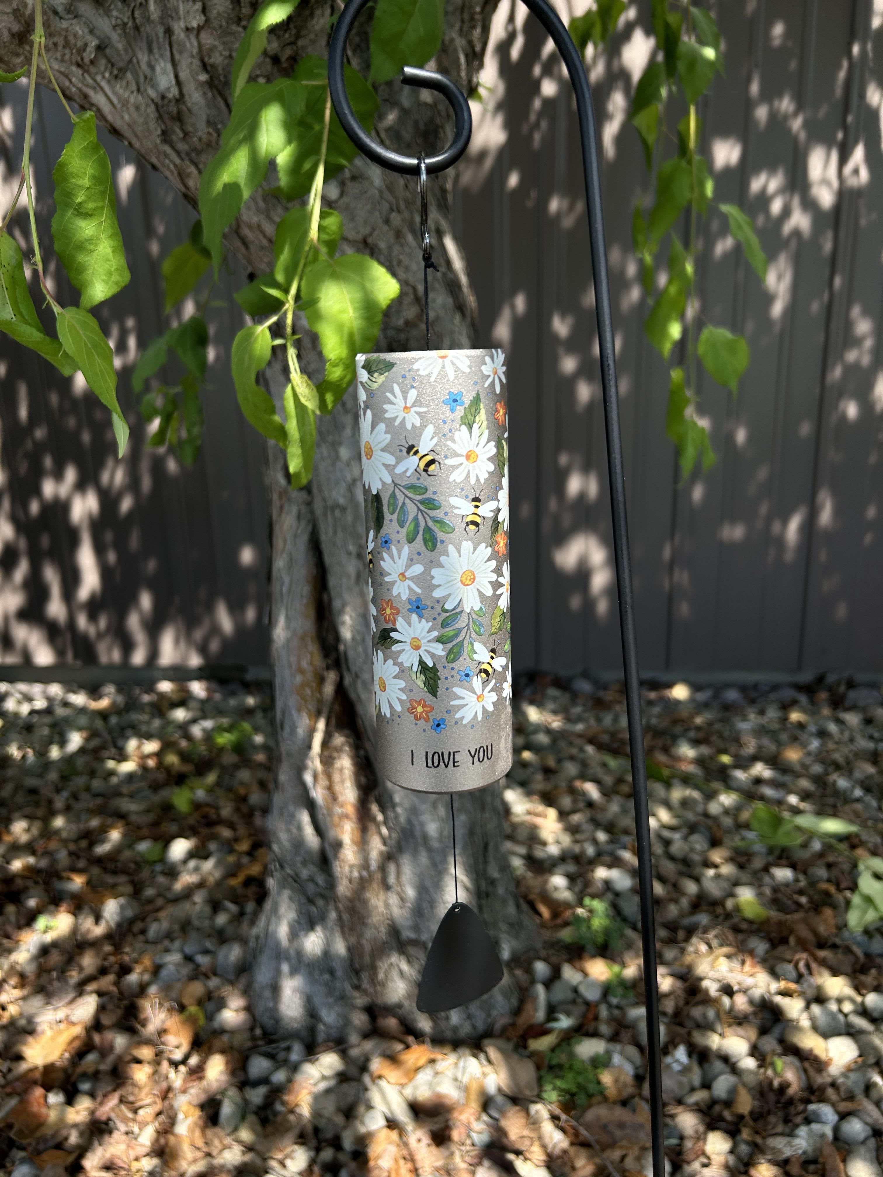 Decorative hanging wind chime with daisies and bees