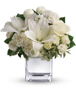 Peace &amp; Joy Bouquet - A modern arrangement of elegant Christmas flowers. White roses, lilies and other favorites are displayed in a chic mirrored silver cube. Simple and affordable, it is a lovely gift that will brighten spirits without breaking your bank. The elegant holiday bouquet includes white roses, white Asiatic lilies, white carnations and white button spray chrysanthemums accented with assorted fresh scented greenery.