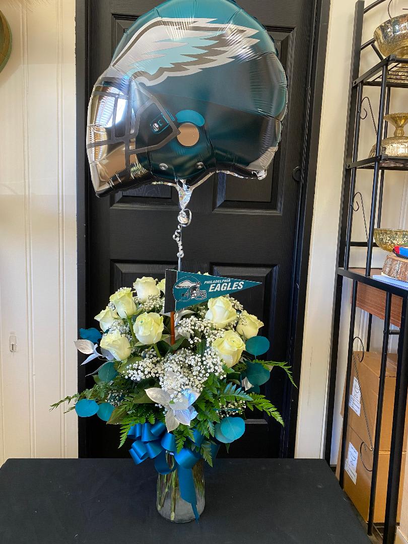 Eagles Fandom - Two birds, one stone.  Send our one dozen white roses with green pins, an Eagles Balloon and pennant to show your love for the Eagles. 