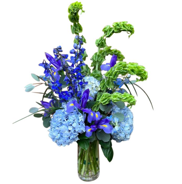 The Blue Ocean Bouquet - Thinking of a vacation? Wanna get away? The bright blues of the Caribbean Ocean are on display with this vibrant bright colored bouquet. 