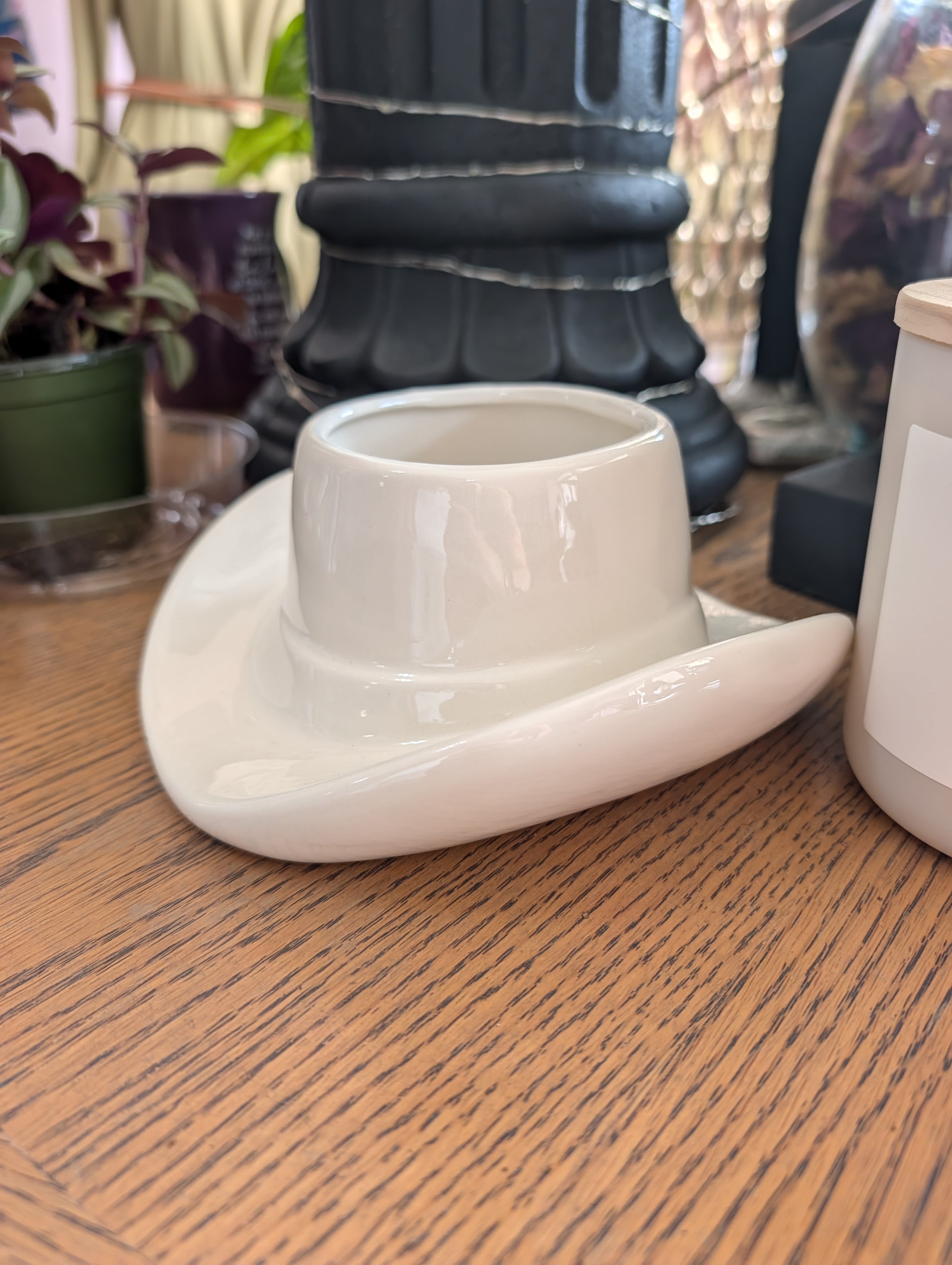 Ceramic Cowboy Hat Planter - A 4" ceramic planter with a removable drainage plug, so you can add fresh flowers or keep a live plant in it.