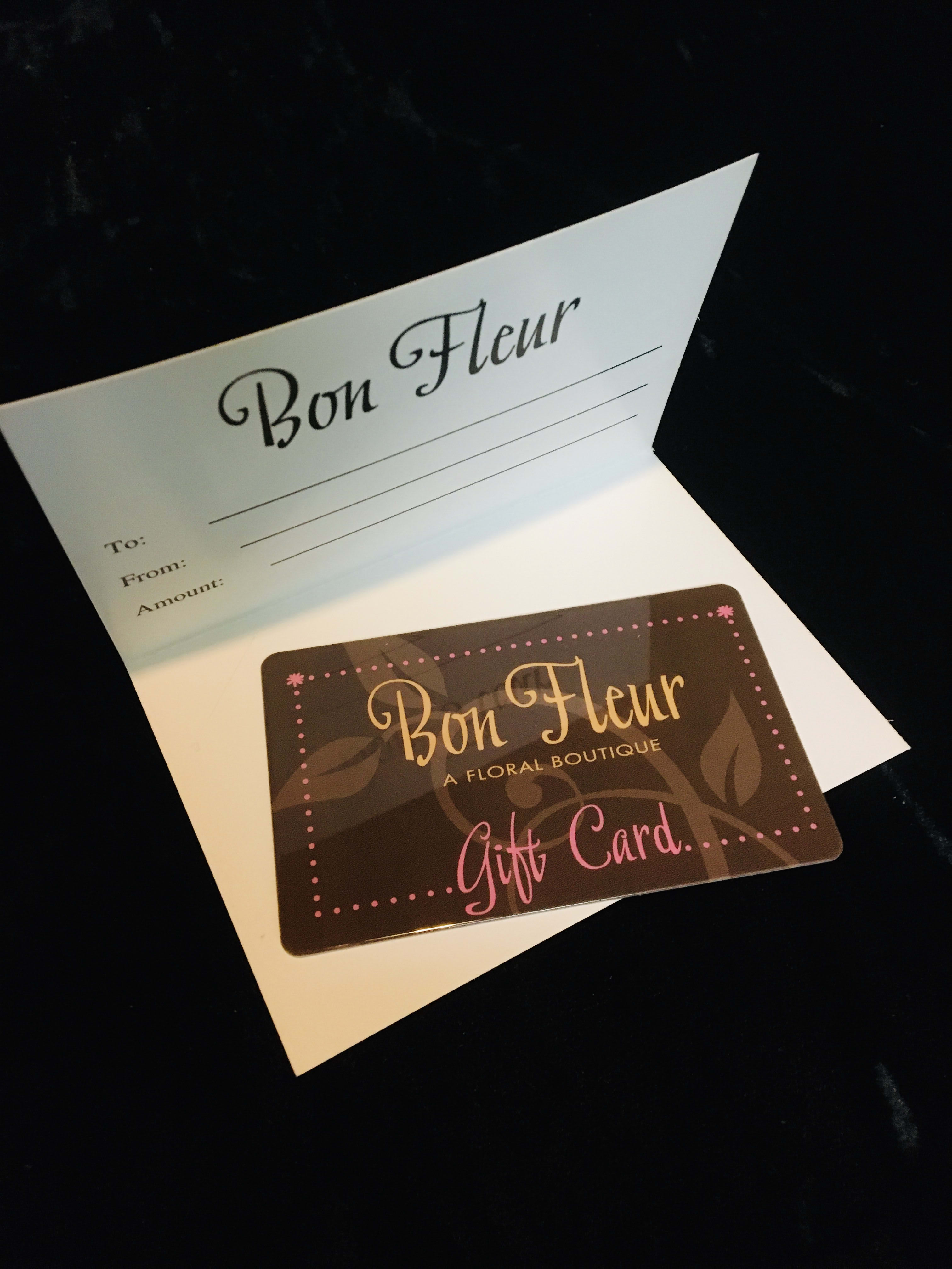 Bon Fleur floral boutique gift card displayed in an open white card holder.