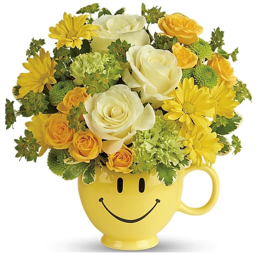 You Make Me Smile Bouquet - Put a smile on their face - and in their heart - with this happy as can be bouquet! Hand-delivered in a food safe mug for years of satisfied sipping, this cheerful gift of roses and mums spreads happiness wherever it goes.
