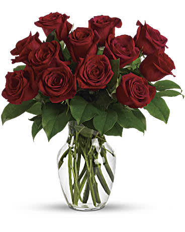 Bouquet of red roses in a clear glass vase