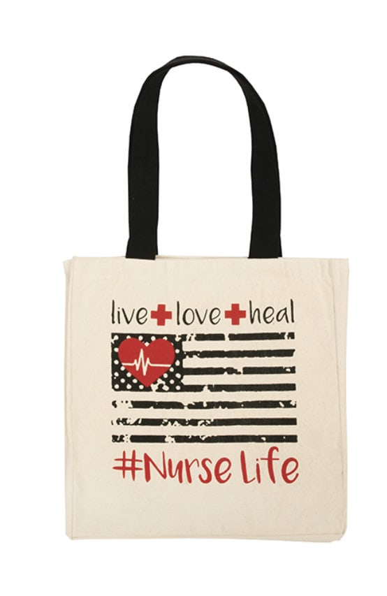 Canvas tote bag with black handles and nurse-themed text and heart graphic