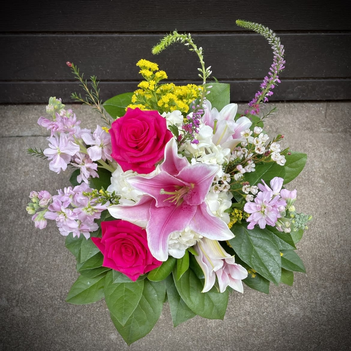 Graceful Garden - The "Graceful Garden" design is a lovely bouquet in Pink, Yellow and White. Including Orient Lilies, Roses, Hydrangea, Veronica, Stock and Aussie Waxflower. A perfect design for any home or office space 