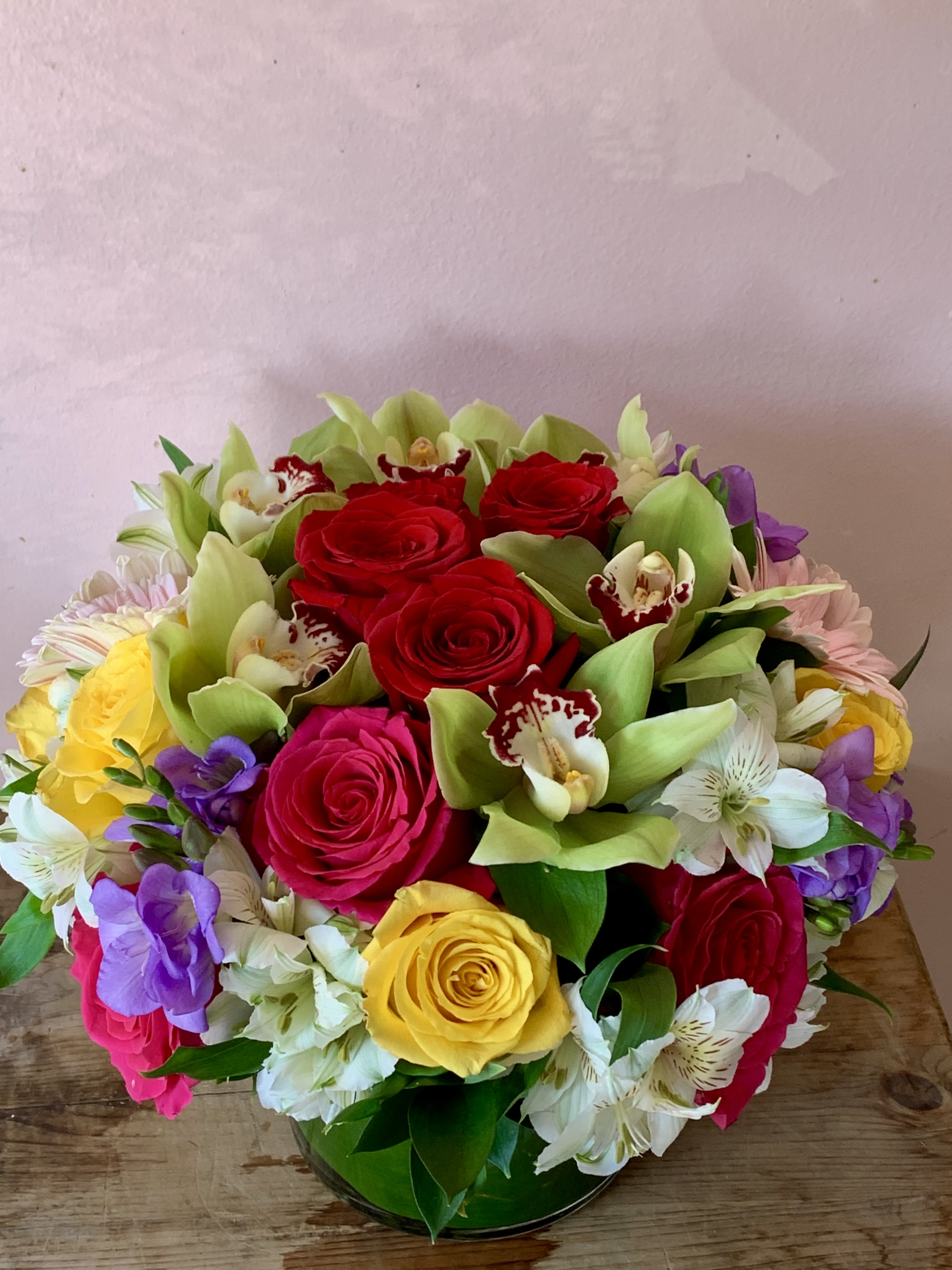 The Paws &amp; Petals Bouquet by Fillmore Florist San Francisco - Give the gift of luxury without the worry. Crafting cat friendly flower arrangements shouldn't mean sacrificing style. Designed by your trusted local florist San Francisco, this vibrant design features a premium selection of 100% non toxic flowers for cats, allowing pet parents to display fresh blooms with absolute peace of mind.  We skip dangerous true lilies, instead hand-selecting magnificent Roses, exotic Cymbidium Orchids, cheerful Gerbera Daisies, and colorful Alstroemeria. While Alstroemeria shares the elegant look of a lily, it is an entirely different plant family that is safe for cats and free of dangerous lily toxins.  Why Pet Parents Love This Arrangement  Zero True Lilies: We maintain rigorous workshop standards to ensure zero cross-contamination.  Long-Lasting: Gerbera daisies and orchids provide exceptional, long-lasting vase life.  Easy Delivery Options Need it fast? Take advantage of our reliable same day flower delivery SF services. As a dedicated local florist San Francisco, we handle our own florist delivery San Francisco operations directly. Rely on us for premium flower delivery in San Francisco from the most trusted florist in San Francisco for stunning, worry-free cat friendly flowers.  Dimensions Approximately: 10"H x 12" W