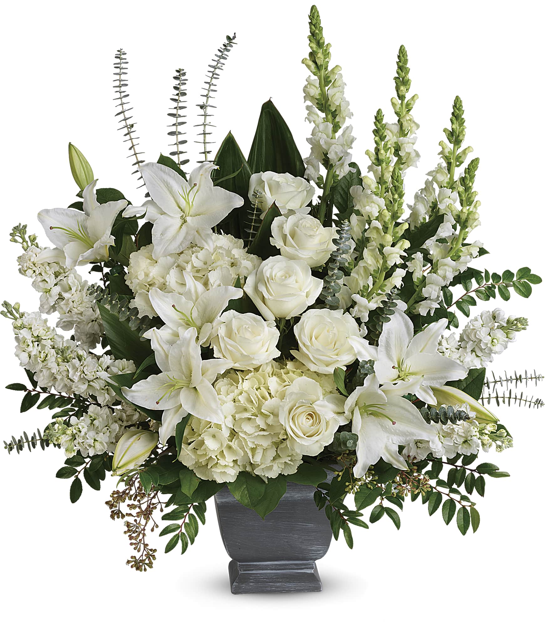 White lilies and roses arranged in a dark vase