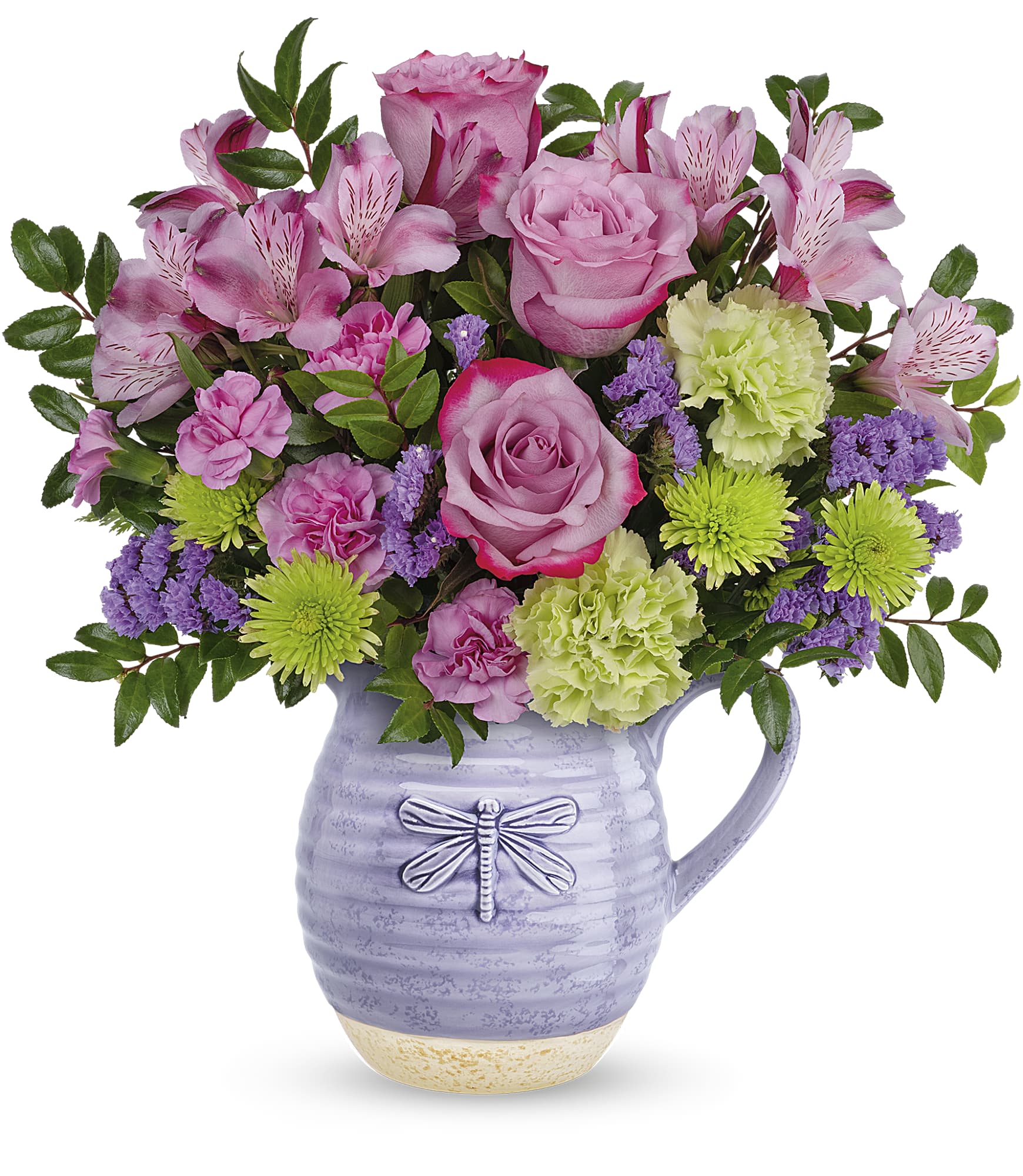 Pink roses and mixed blooms in a lavender pitcher vase