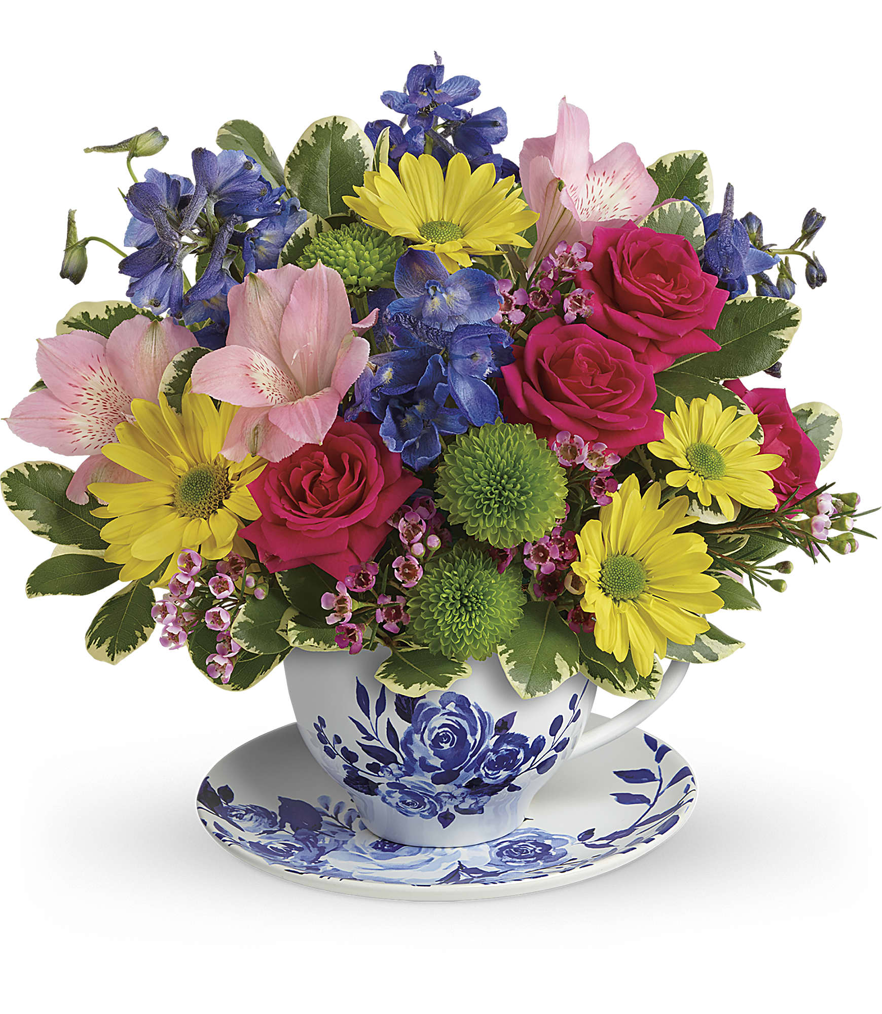 Colorful bouquet in a blue-and-white teacup with saucer