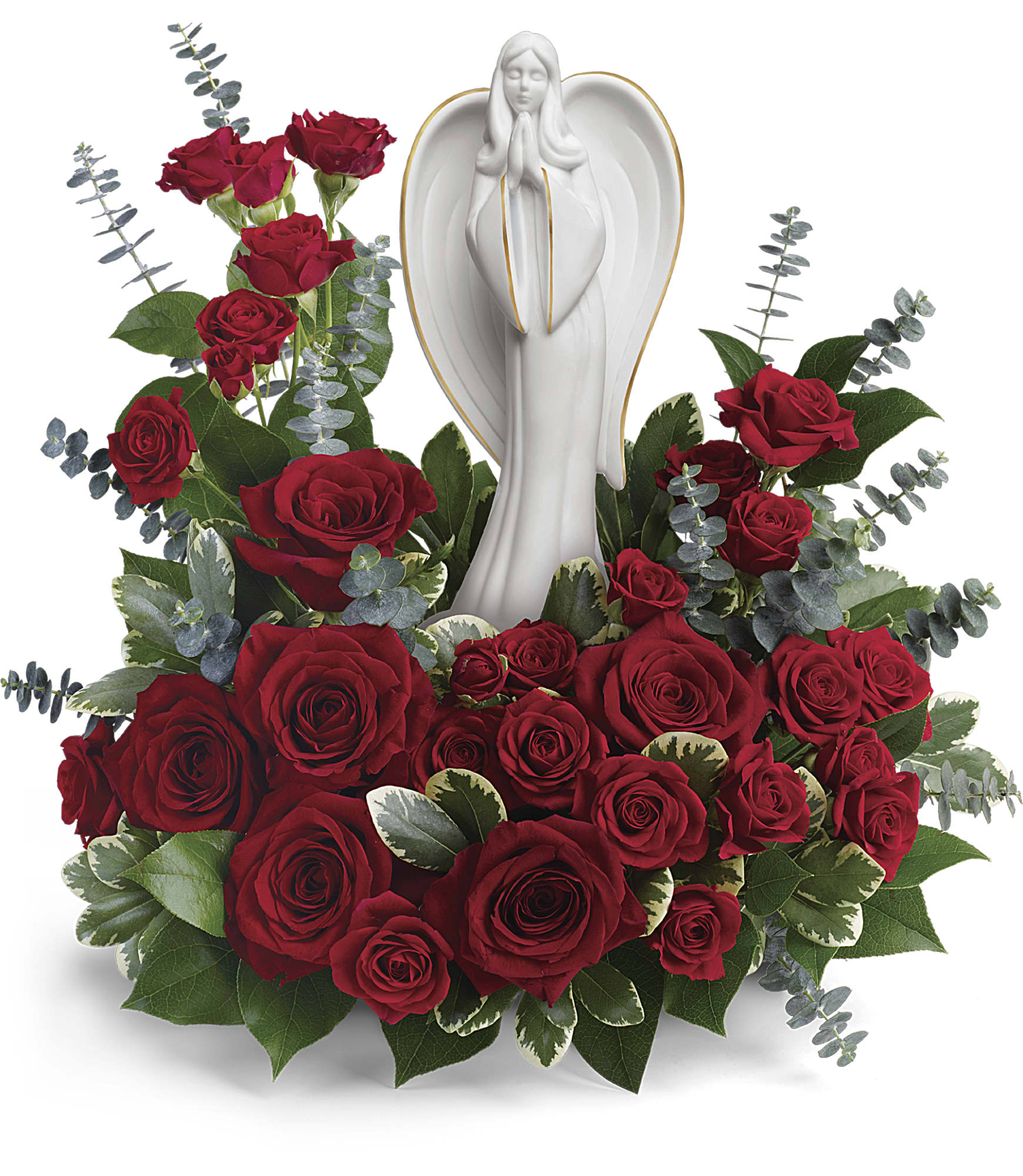 Red roses arranged around a white angel figurine