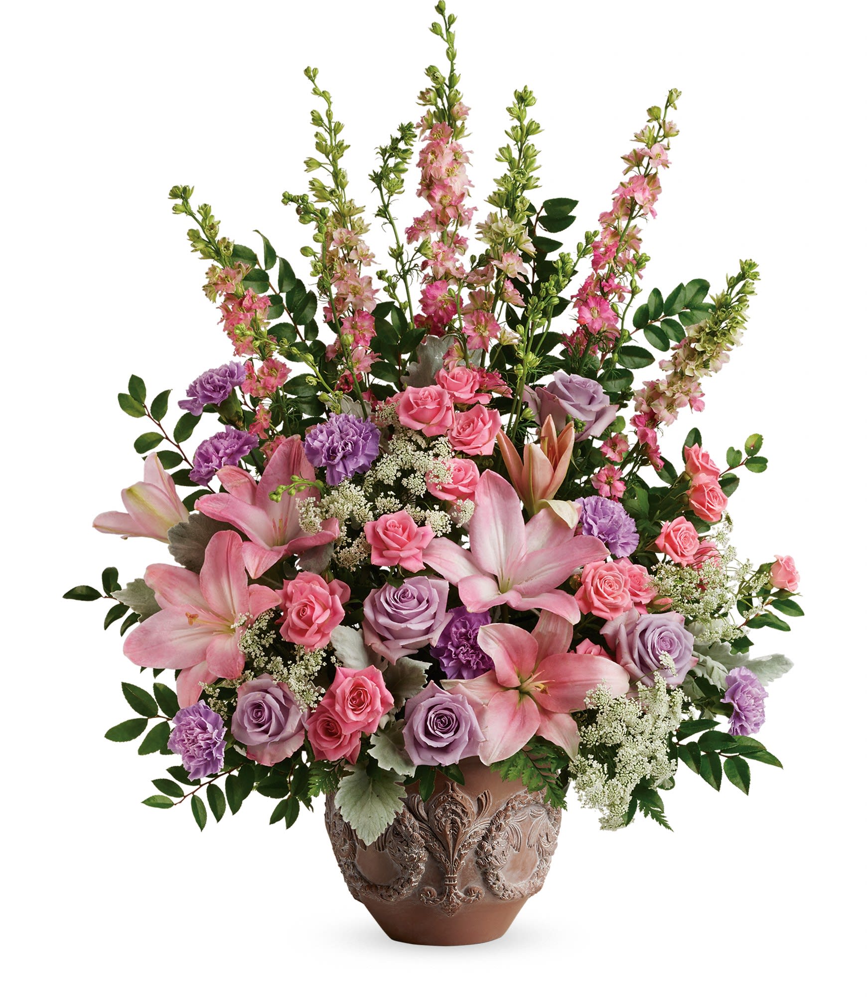 Pink and lavender floral arrangement in a decorative vase