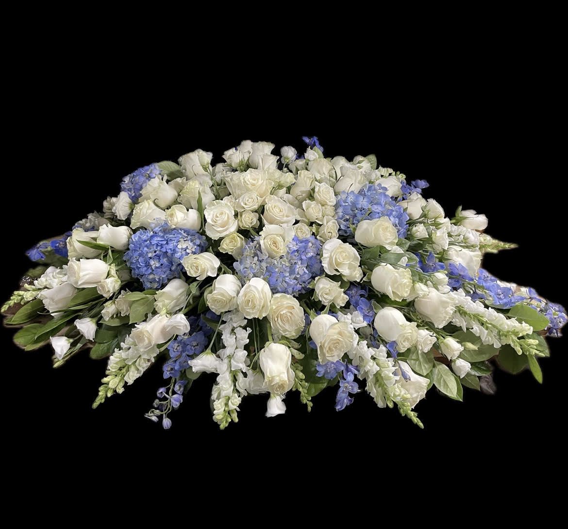 Large white and blue floral casket spray
