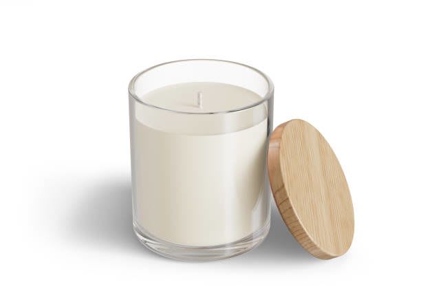 White candle in a clear glass jar with a wooden lid