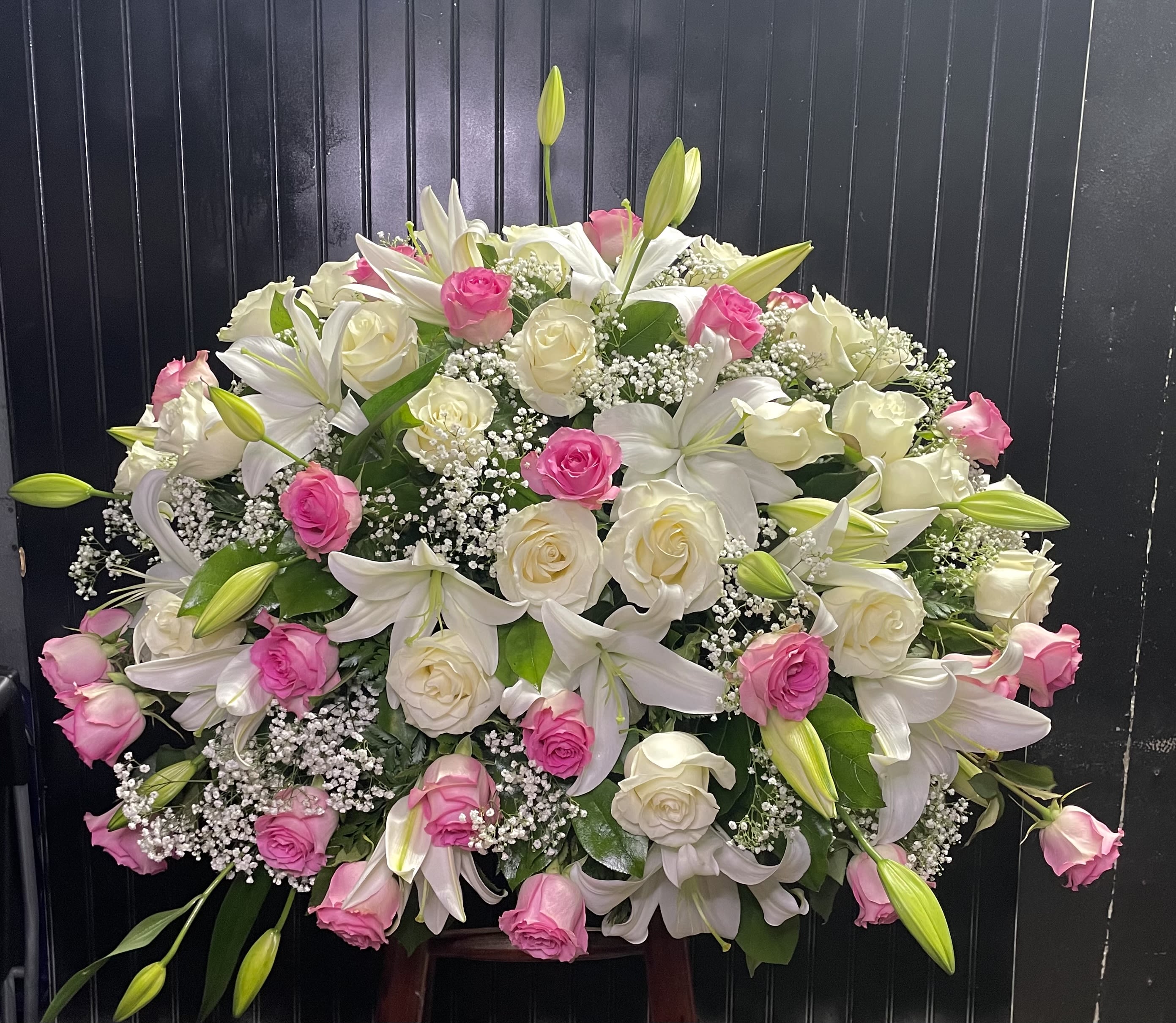 Large bouquet of white lilies and pink and white roses