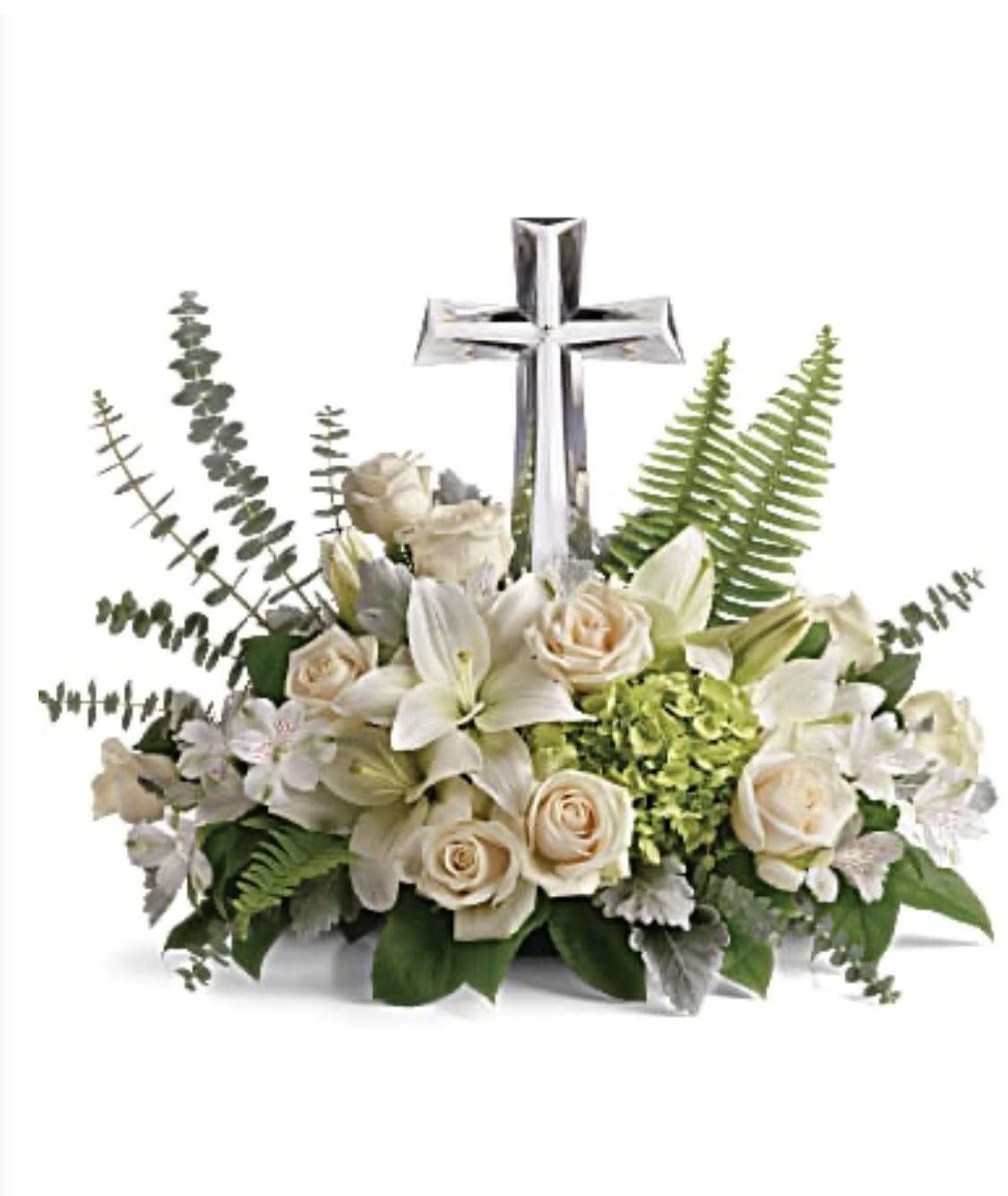 White floral arrangement with a silver cross centerpiece