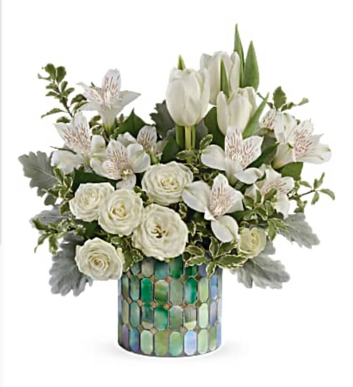 White tulips and roses in a mosaic glass vase