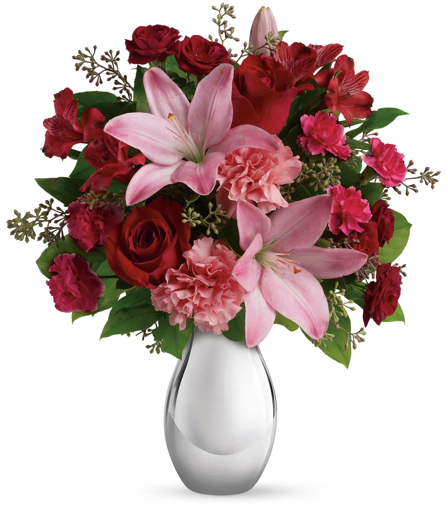Moonlight Kiss Bouquet - She'll feel the love when she receives this gorgeous array of roses, lilies and more artistically arranged in a dazzling silver reflections vase. You'll also feel the love when she finishes oohing and aahing and turns to thank you. 
