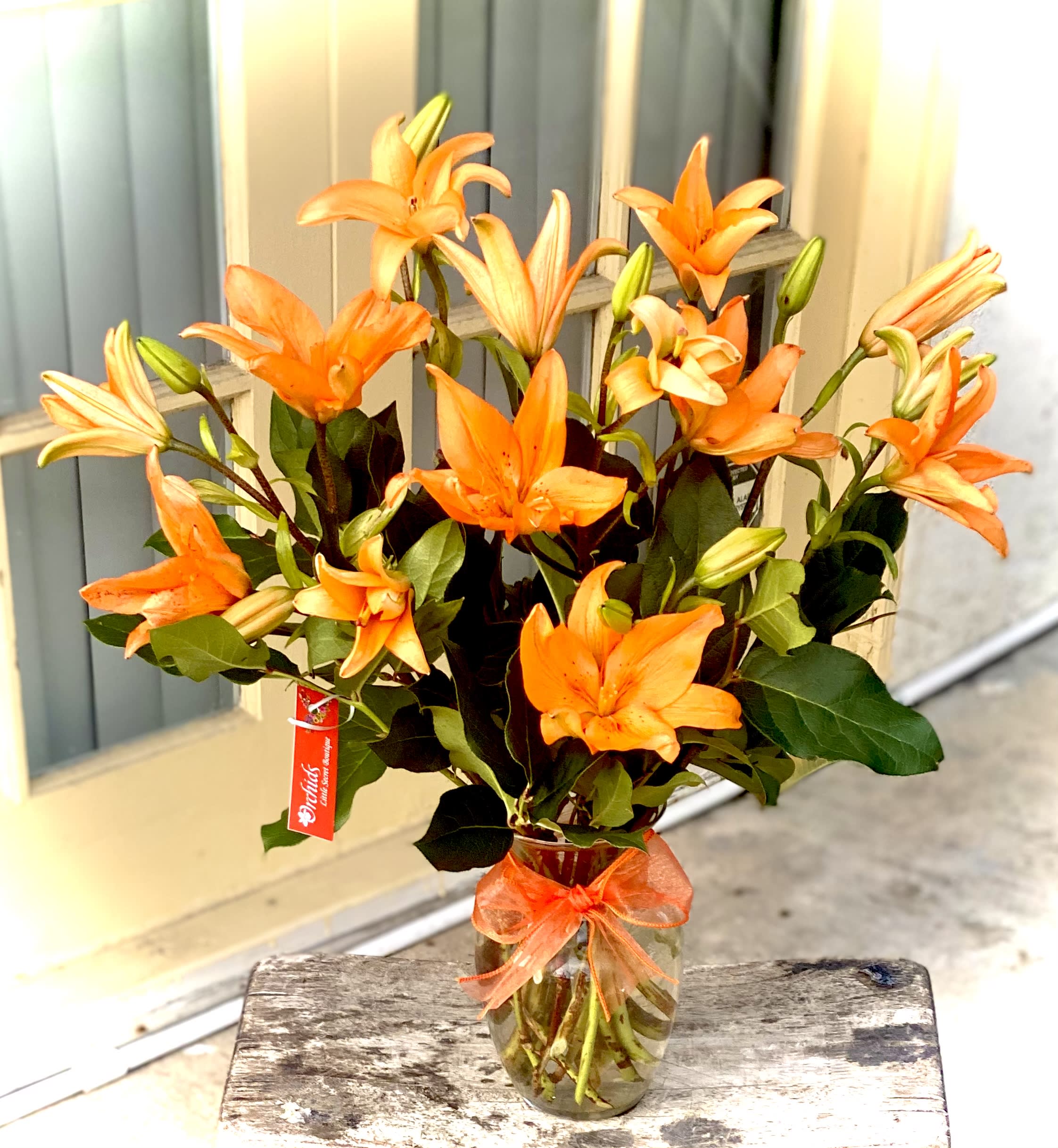 Orange Asiatic Lily Ignite Bouquet in Placentia, CA | Orchids