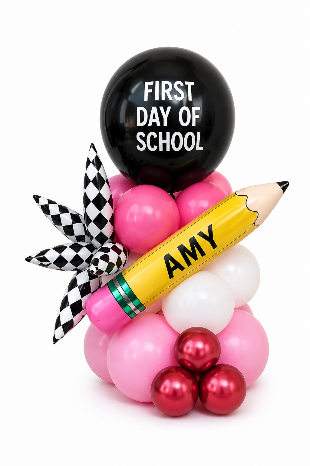 Balloon arrangement with a black "First Day of School" balloon and a yellow pencil balloon