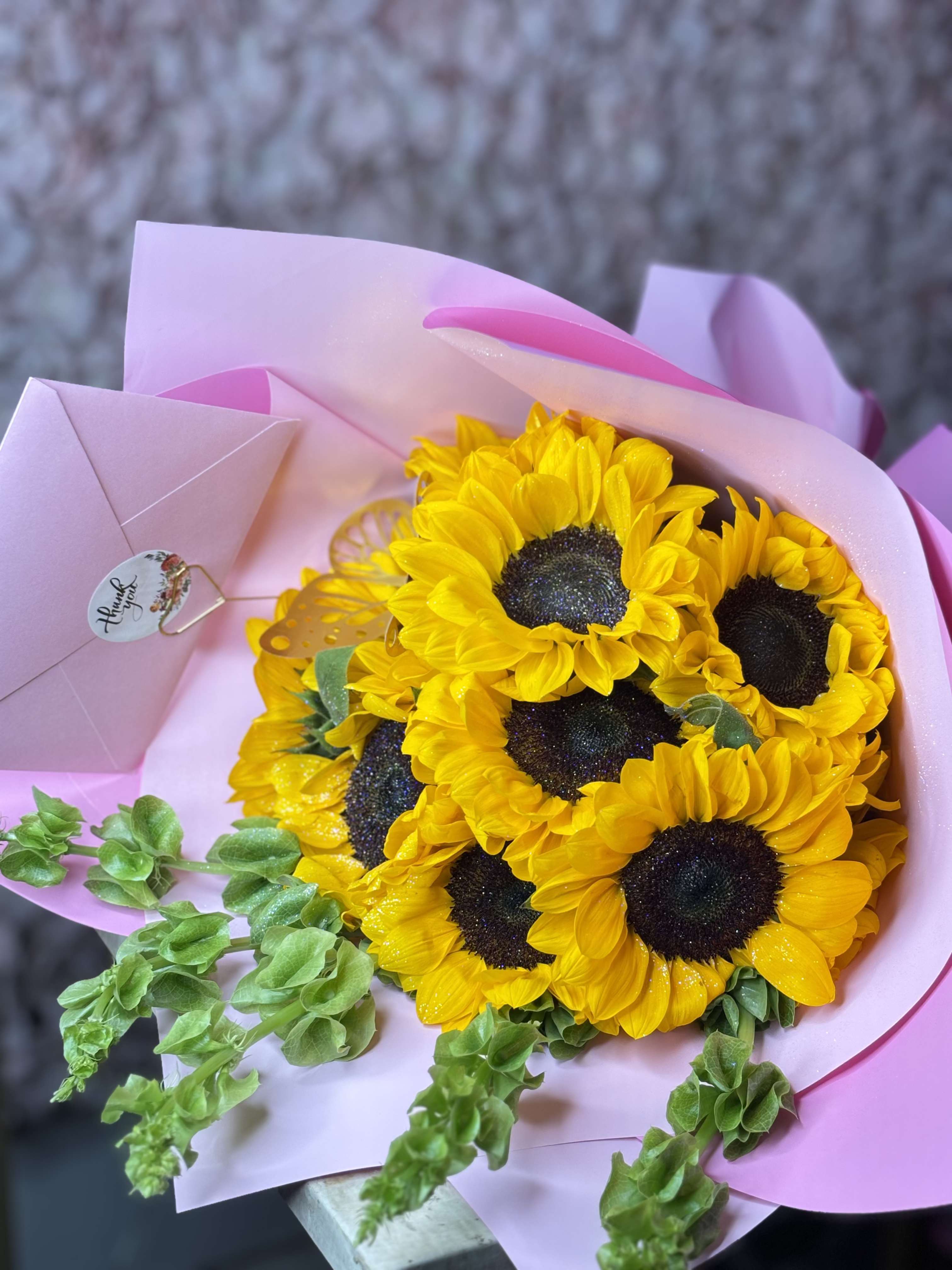 Sunflowers Sunshine - A radiant bouquet designed to brighten someone’s day instantly. This arrangement features fresh, vibrant sunflowers carefully wrapped in our signature elegant style, creating the perfect balance between simplicity and luxury.  Perfect for birthdays, congratulations, get well wishes, or simply to send a little sunshine    Details: • Premium fresh sunflowers • Handcrafted wrapping • Designed with love and care • Same-day delivery available in Houston &amp; Katy   A beautiful reminder that even the simplest flowers can bring the biggest smiles. 