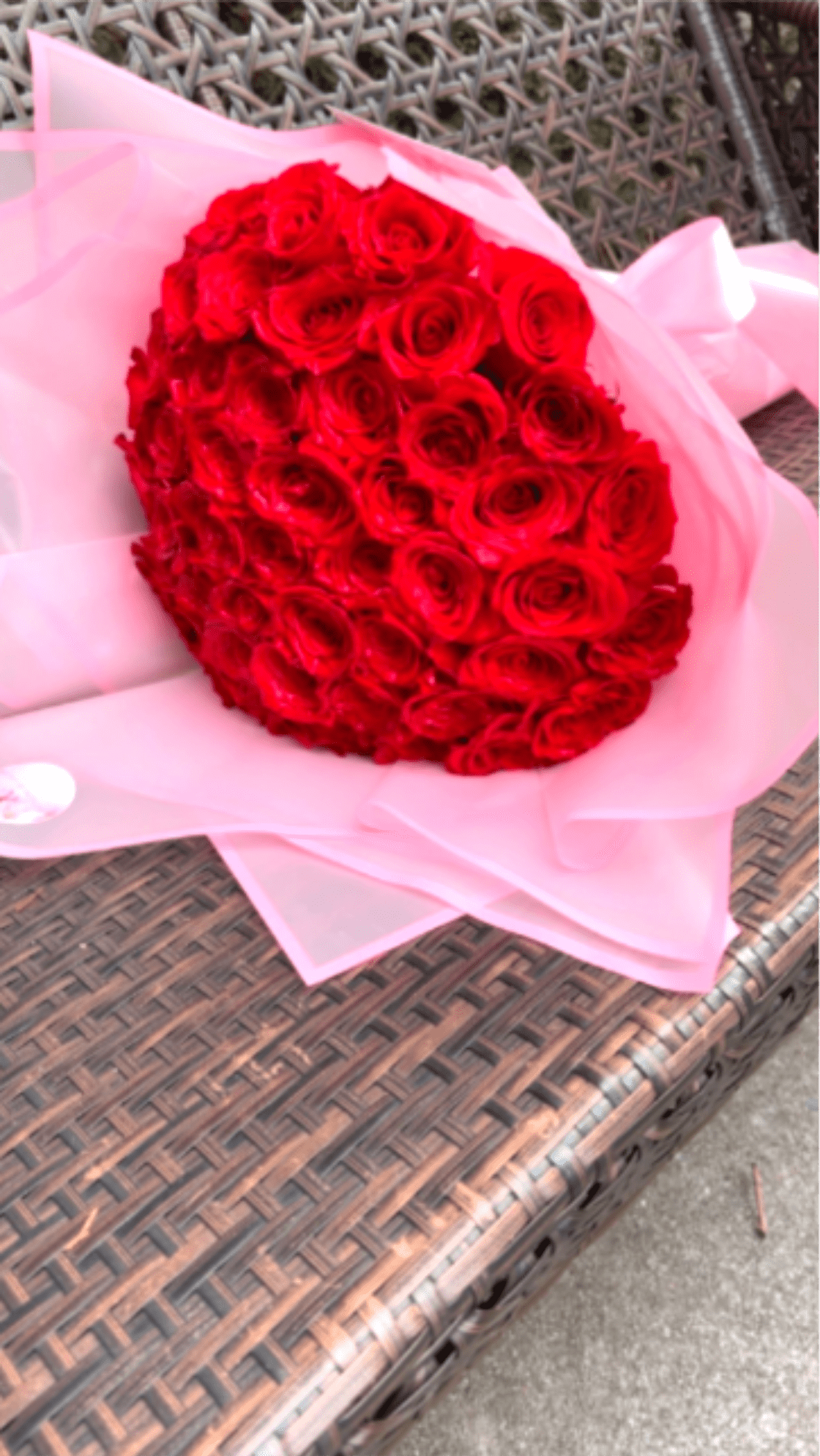 Velvet Love Red Rose Collection ( 50 Count Long Stem Roses Ramo Buchon Style ) - Make a bold and unforgettable statement with this luxurious bouquet of 50 premium red Ecuadorian roses, beautifully hand-designed with long 60cm stems and wrapped in soft pink presentation paper for an elegant, romantic finish.  Our Ecuadorian roses are known for their large blooms, rich color, and long-lasting freshness, making this arrangement perfect for expressing deep love and admiration. Whether you’re celebrating an anniversary, Valentine’s Day, a birthday, or sending a surprise “just because,” this stunning rose bouquet delivers pure romance.  Each arrangement is handcrafted by your local florist and available for same-day flower delivery when ordered early.  Details:  ️ Fresh premium red Ecuadorian roses   Long stems: approximately 60 cm   Elegant pink wrap, heart-shaped design   Premium, long-lasting blooms   Same-day delivery available  Perfect for: Anniversary flowers, romantic gifts, Valentine’s Day roses, birthday surprises, or luxury rose delivery.  Show your love with timeless beauty and unforgettable elegance.  