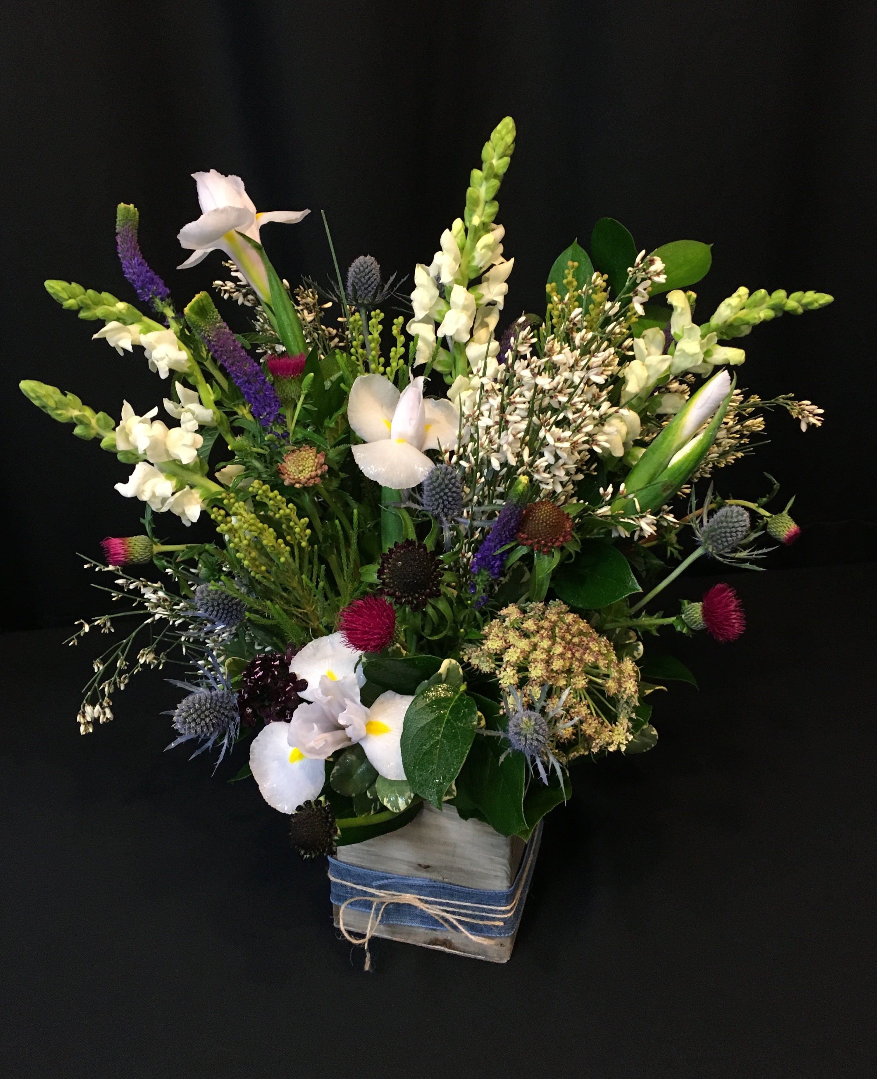 Rustic Wooden box - An assortment of local grown flowers plus unique accent flowers you won't find anywhere else arranged  in a pretty wooden box wrapped with linen ribbon and twine. Selection and colors will vary with each season.