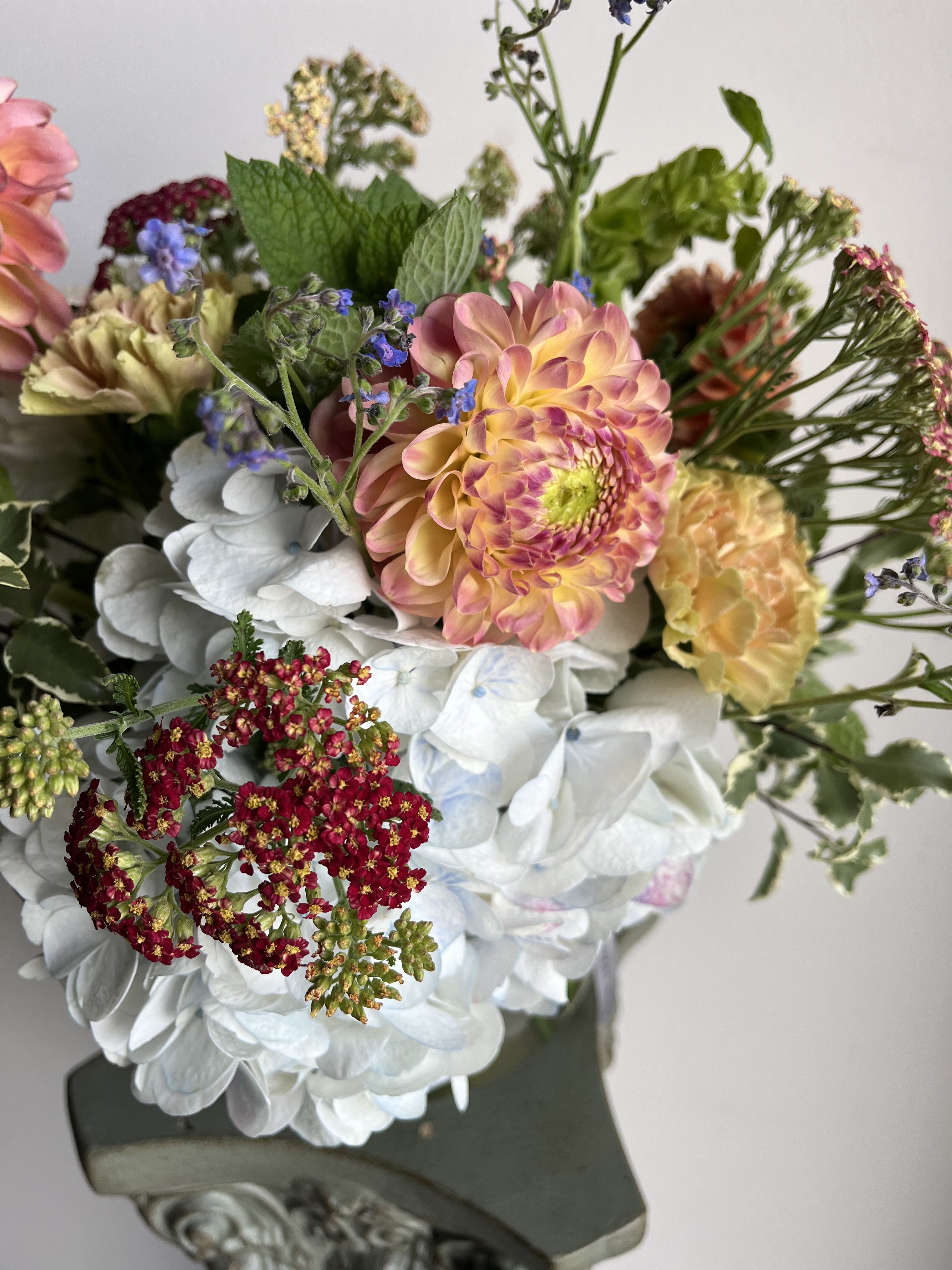 Seasonal Vase Florist's Choice  - A beautiful vase arrangement filled with fresh seasonal flowers in the prettiest colors of the moment. Hand-designed with blooms that vary daily, making each piece one of a kind. Flowers and vases will vary according to availability.