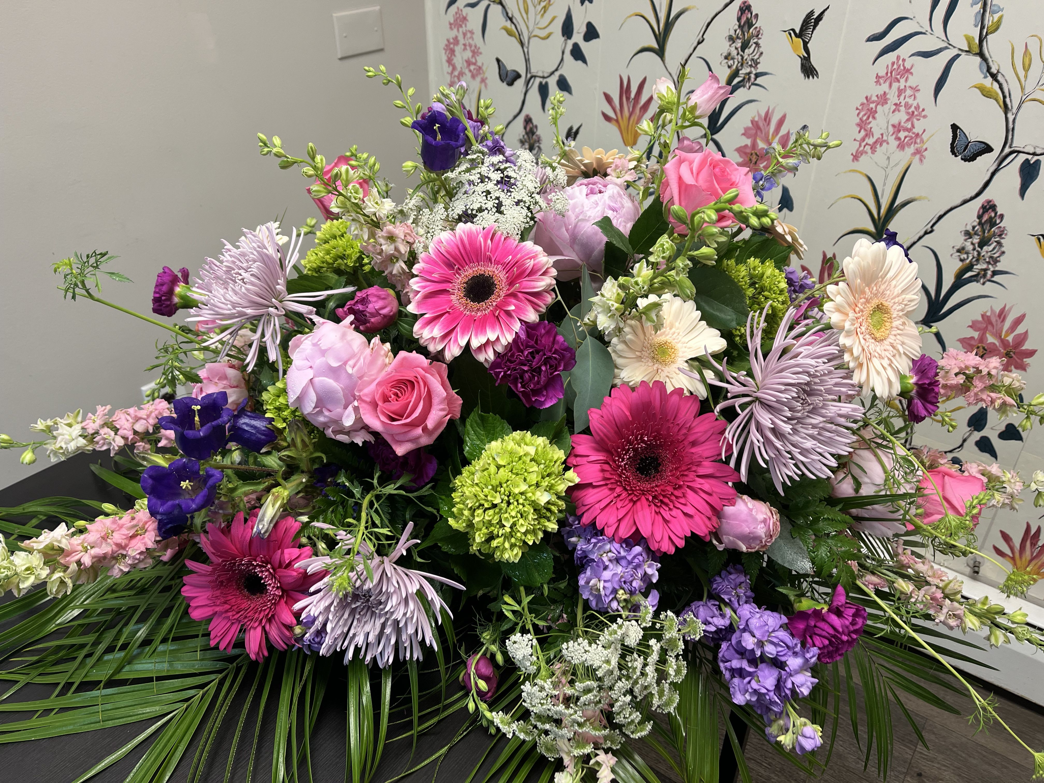 Large mixed bouquet with pink, purple, and white flowers