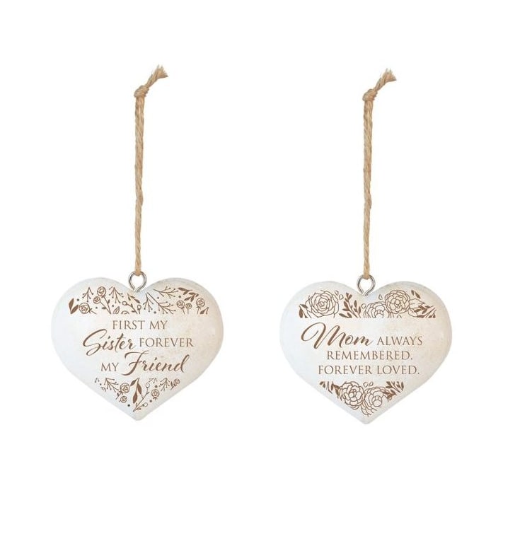 Two heart-shaped hanging ornaments with sentimental text