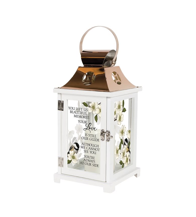 White memorial lantern with floral panels and a sympathy message