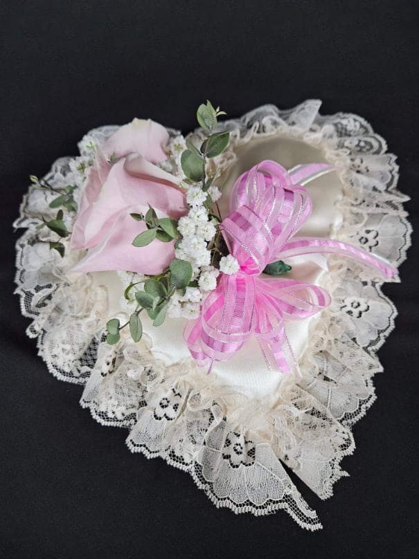 Pink rose with lace trim and ribbon bow