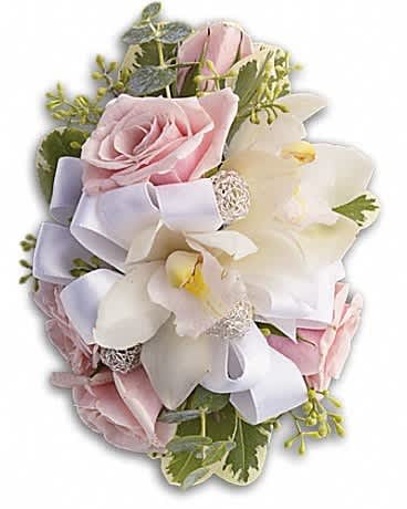 Pink roses and white orchids with a white ribbon bow