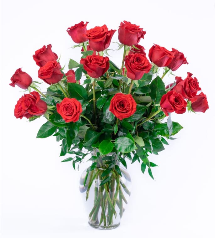 Bouquet of red roses in a clear glass vase