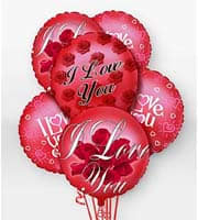Cluster of red heart-shaped balloons with love messages