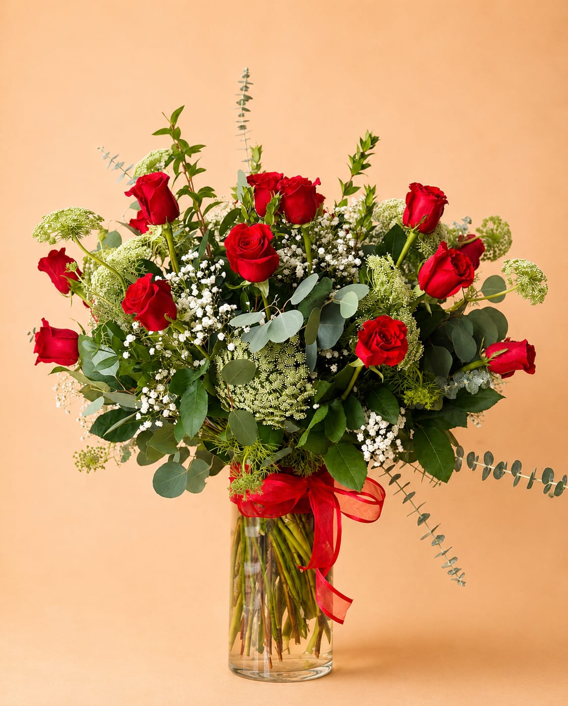  2 Dozen Roses Arrangement Standard - 24 Premium Freedom roses imported from Ecuador, with greens and fillers. Built in a 6”x12” glass vase.