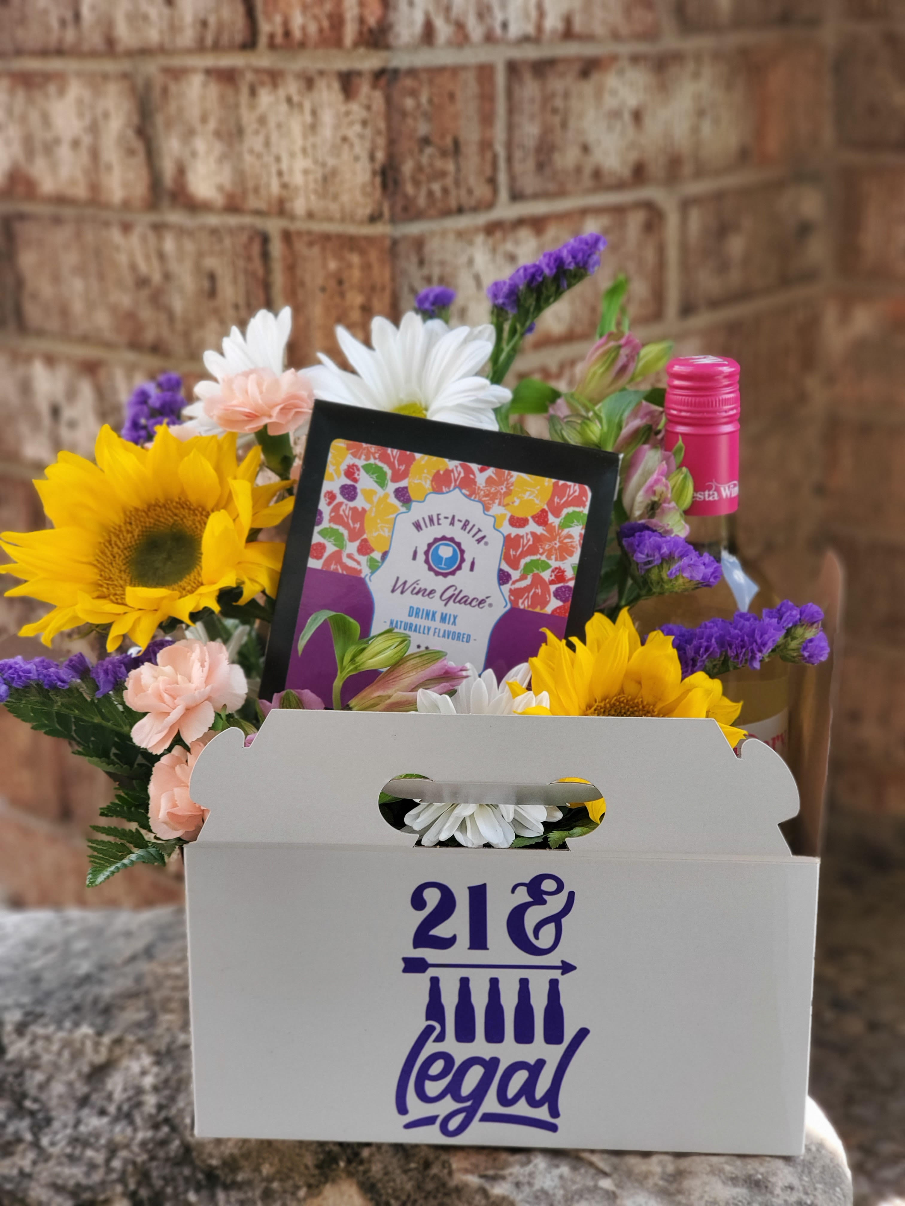 Flower gift box with sunflowers, daisies, carnations, and a wine mix packet