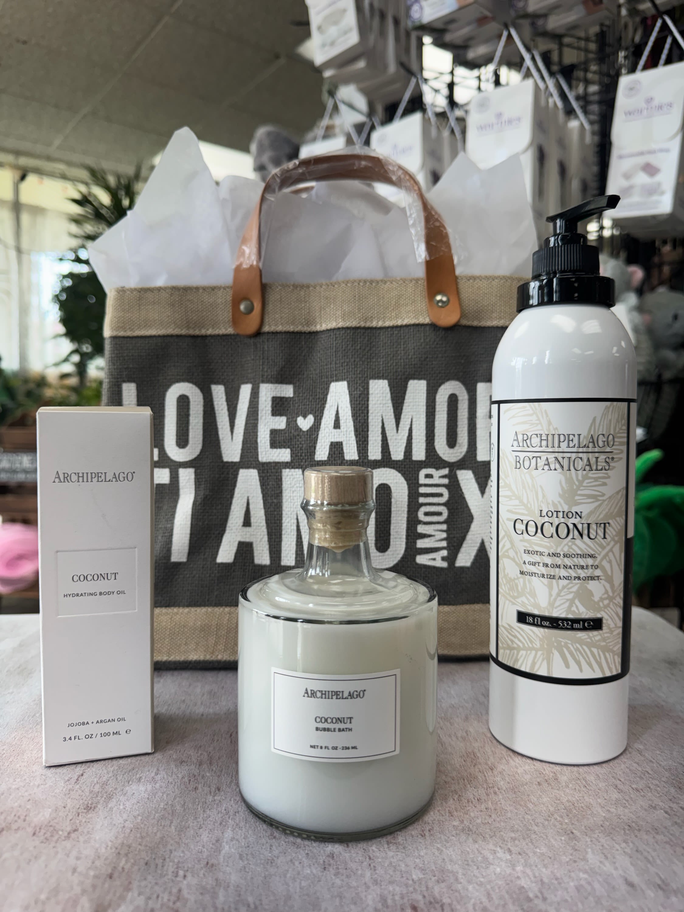 Archipelago Coconut by the Sea Collection - A refreshing escape inspired by soft ocean breezes and sun-kissed relaxation, thoughtfully designed for Mother’s Day.  The Coconut by the Sea collection features a curated trio of bath and body essentials that nourish the skin while creating a light, uplifting sensory experience. This collection blends coconut oil, coconut water, natural extracts, and jojoba esters to deliver deep hydration and a smooth, non-greasy finish.  Infused with alpha hydroxy acids and natural fatty acids, each product helps soothe dry skin while supporting a healthy, radiant glow. Soft notes of coconut water, lemon verbena, and citrus create a clean, refreshing fragrance that feels both calming and revitalizing.  This collection includes a hydrating body lotion, nourishing body oil, and soothing bubble bath, each designed to work together for a complete self-care ritual.  A beautiful way to give the gift of relaxation, renewal, and a touch of coastal luxury this Mother’s Day.