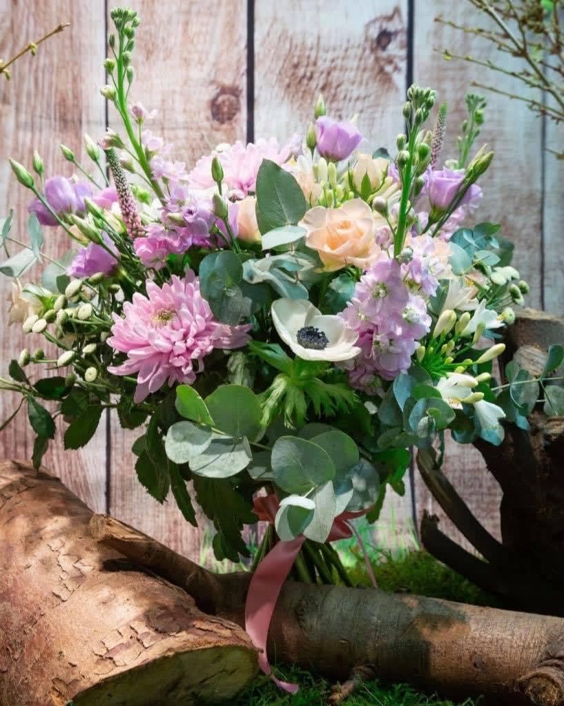 Pastel bouquet with pink, lavender, and cream flowers