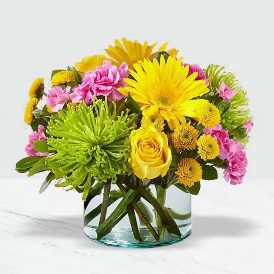 Fresh Fizz - Petite  - Overflowing with Carnations and crowd-pleasing Gerbera, Daisies, this handcrafted bouquet puts the cherry on top of any celebration.
