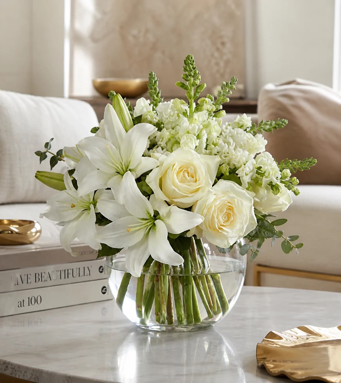 Quiet Elegance  - Timeless, refined, and effortlessly beautiful — the Quiet Elegance Bouquet is designed to make a lasting impression through simplicity. Featuring pristine white blooms and lush greenery, this arrangement brings a sense of calm, sophistication, and grace to any space. Perfect for expressing love, sympathy, gratitude, or simply elevating a home with understated luxury.
