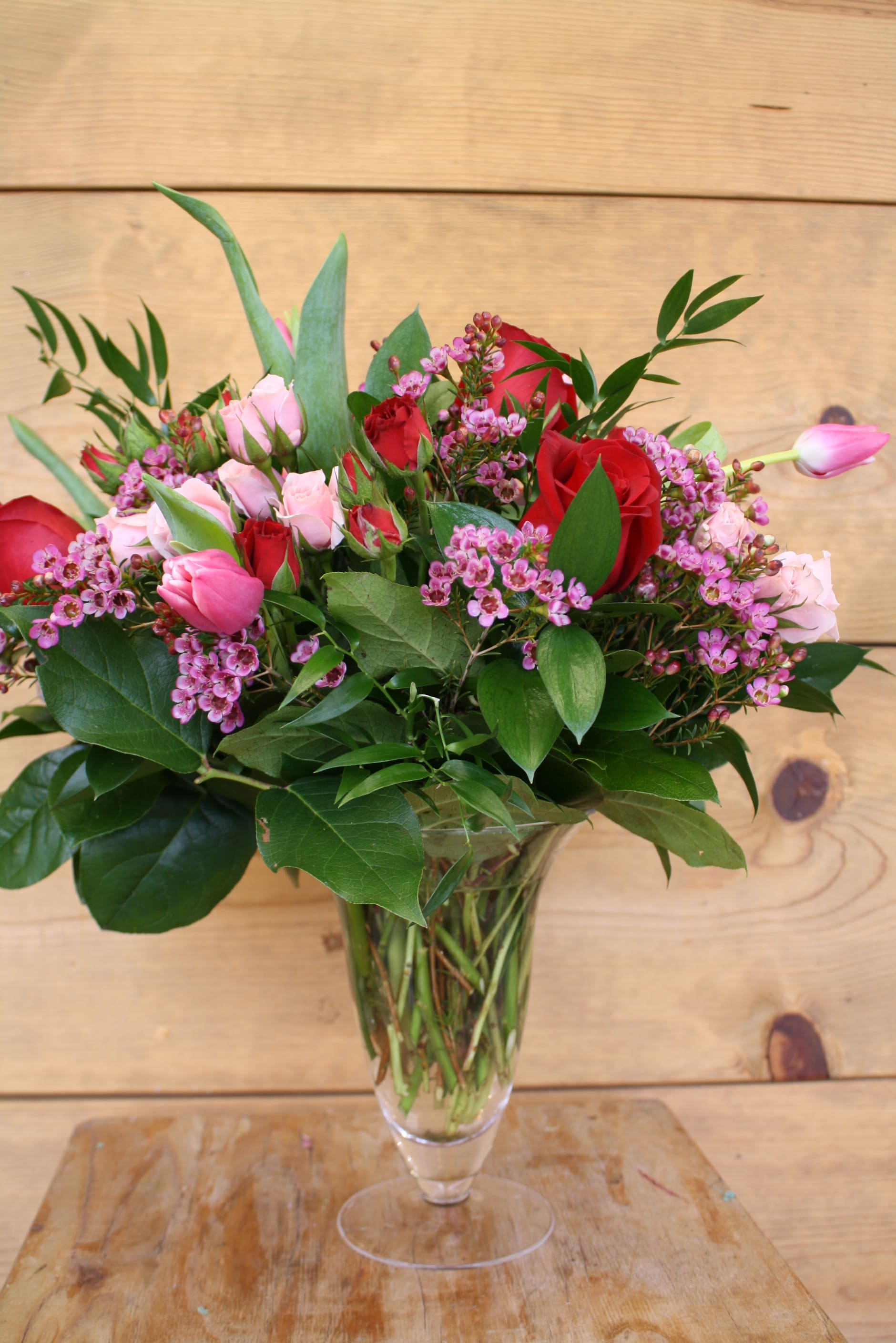 Love Like Flowers - Elegant vase filled with mixed seasonal blooms.  