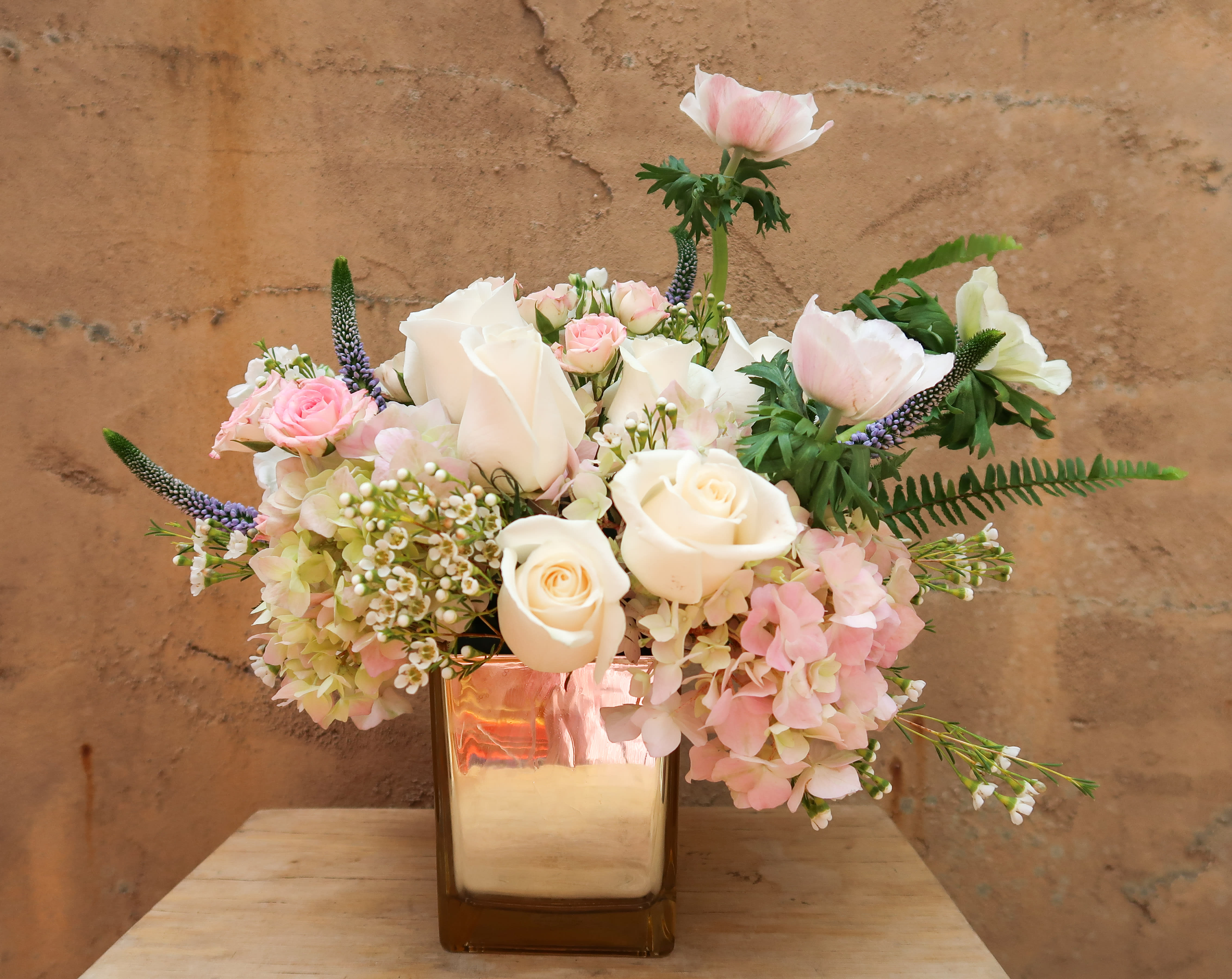 Hello Baby in Pink - Welcome Baby! The perfect gift for any new mom and baby filled with lushes white and pink tone flowers. This bouquet is sure to make her smile. 