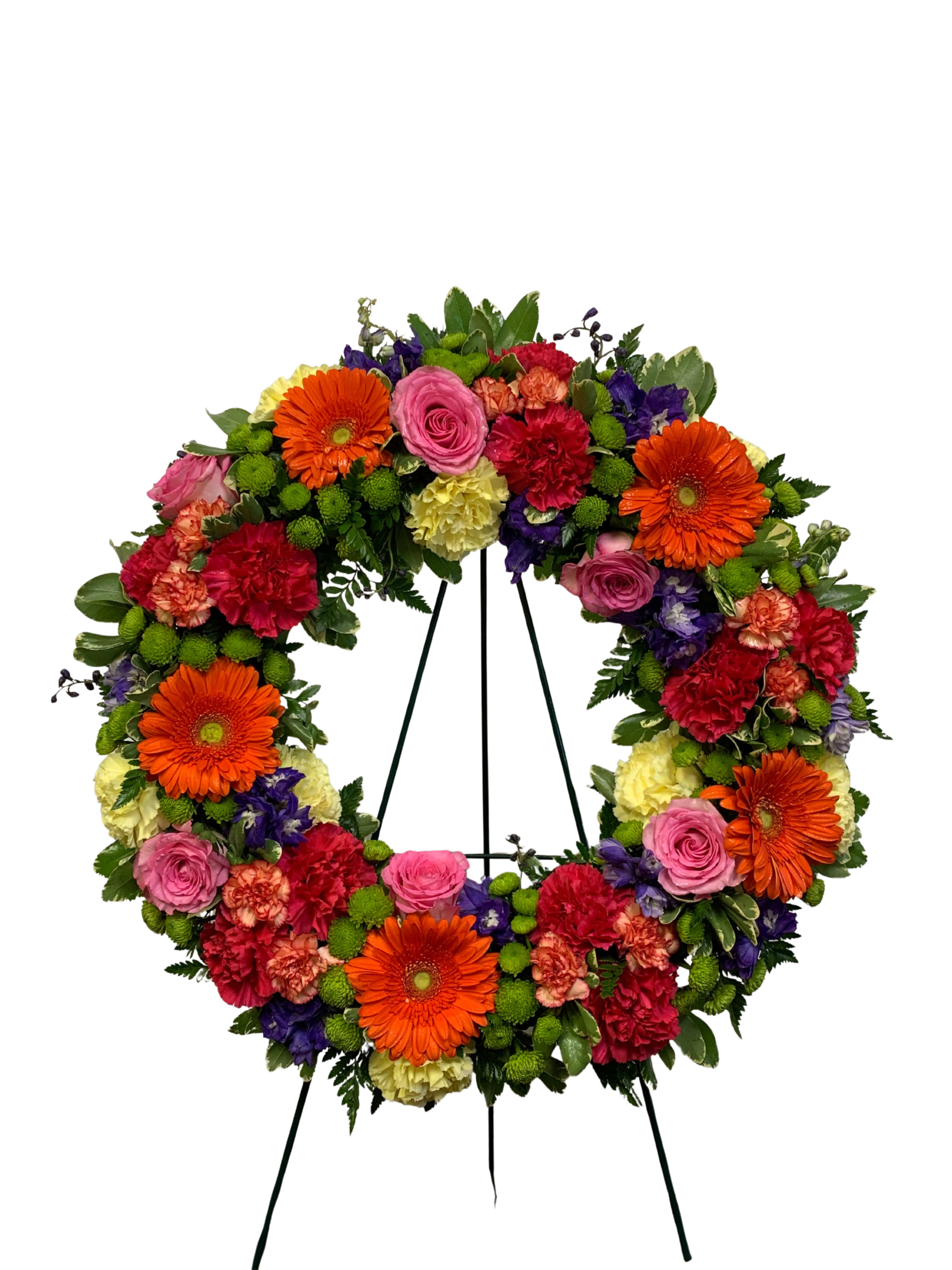Bold Love Standing Spray  - Bright and Colorful Standing Spray featuring Orange Gerber Daisys and Light Pink Roses