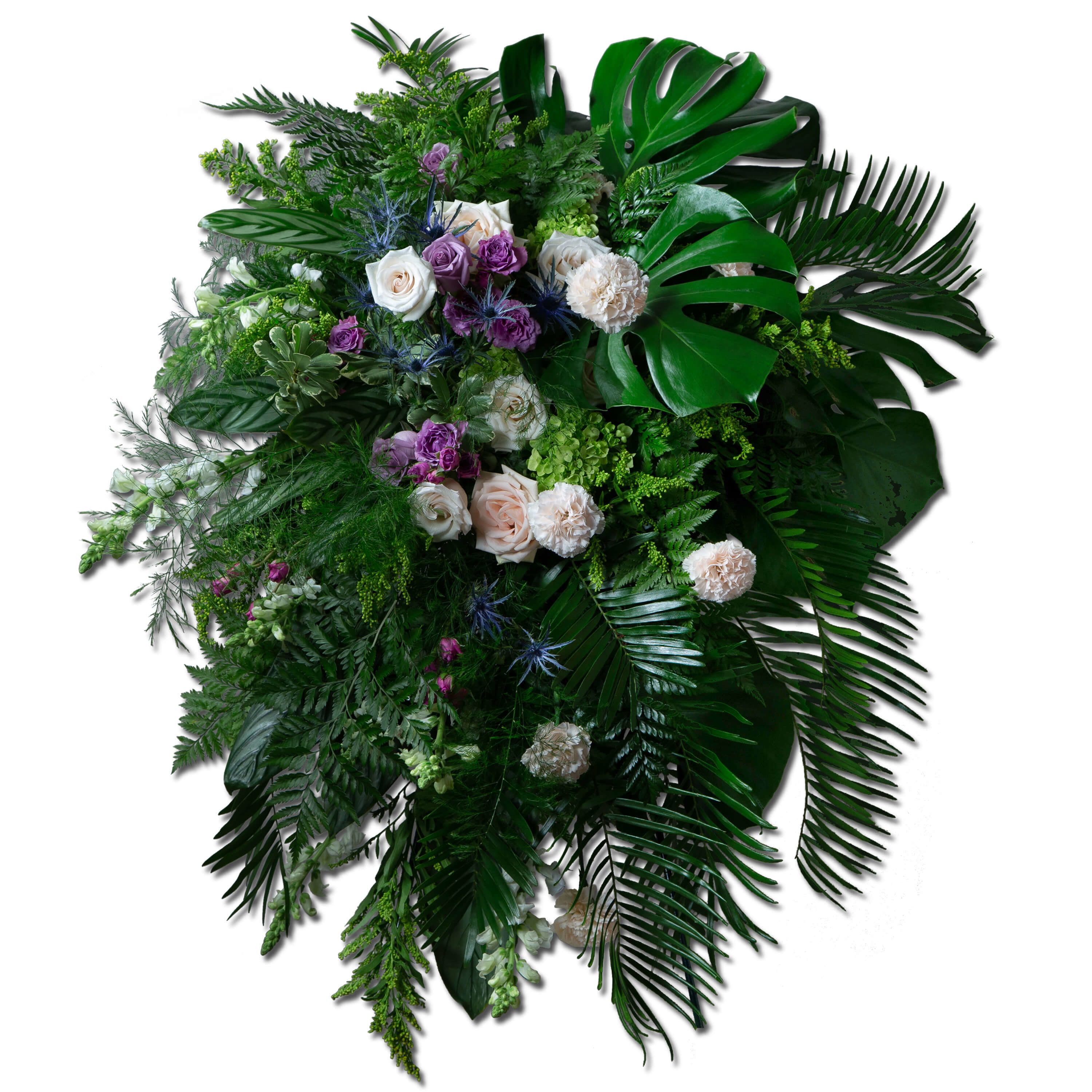 Heartfelt Remembrance Standing Spray - A standing spray is a formal floral sympathy piece designed for use in a memorial, funeral or graveside service. This heartfelt expression features an impressive design of Florida foliage including calathea, leather leaf, fancy fern, tree fern, coontie,