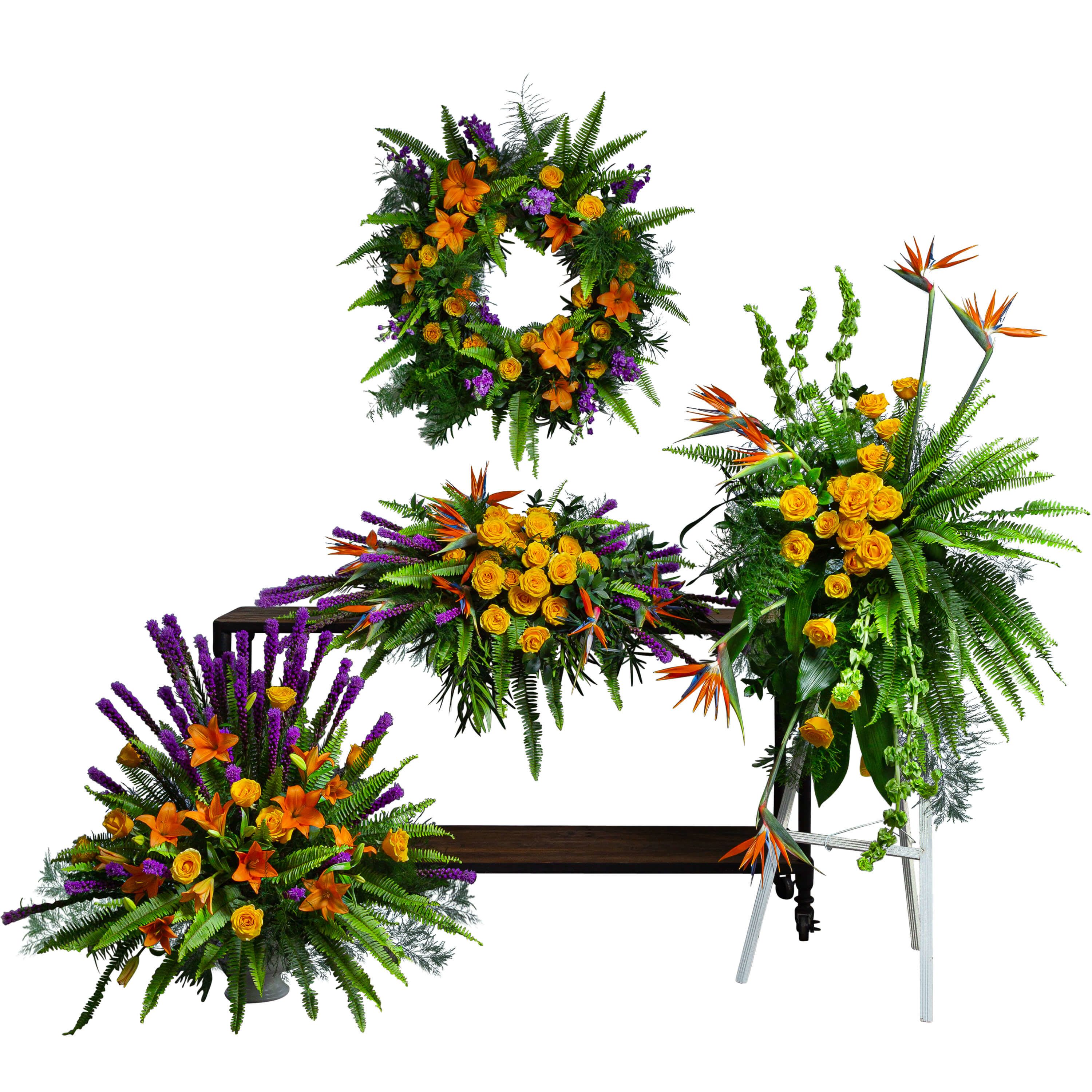Birds of Solace Collection - The Birds of Solace Sympathy Collection is a beautiful tribute to a loved one. Designed with vibrant orange lilies, yellow roses, purple liatris, and lush green ferns, this collection is appropriate for display at a funeral service.
