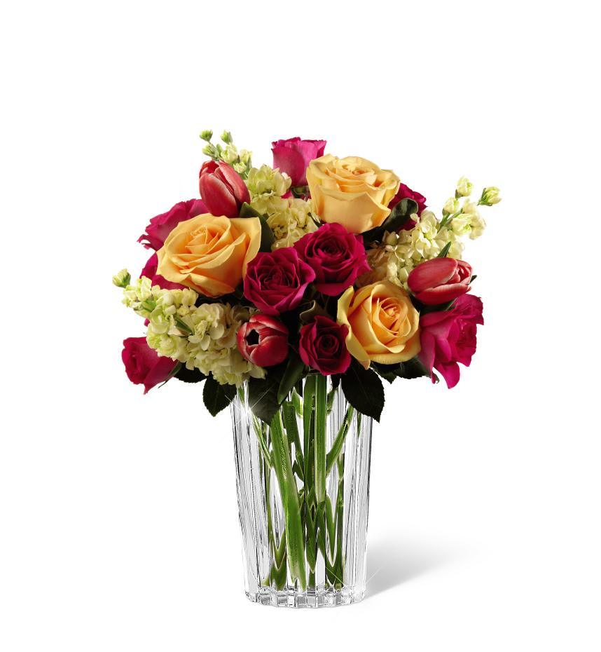 The FTDÂ® Beauty and Graceâ¢ Bouquet by Vera Wang - FTDÂ® proudly presents the Vera Wang Beauty and Graceâ¢ Bouquet. A   stunning display of sun-crushed sophistication, this bouquet of fuchsia   tulips, pale yellow stock, peach roses and hot pink spray roses demands   their attention. Presented in a modern clear glass vase, this incredible   arrangement is sure to convey your warmest wishes with each sunlit   bloom. GOOD bouquet includes 12 stems. Approx. 16âH x 12âW. BETTER   bouquet includes 18 stems. Approx. 18âH x 13âW. BEST bouquet includes 22   stems. Approx. 19âH x 14âW. 