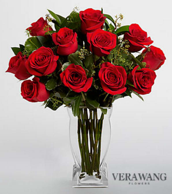 Vera Wang Red Rose Bouquet  - VASE INCLUDED - Picked fresh from the farm, the Vera Wang Red Rose Bouquet is a gift of luxury like none other. Hand gathered at select floral farms, exquisite 20-inch premium long-stem roses showcase an attractive, rich red hue to send your most romantic intentions to your sweetheart no matter the distance. Picked fresh for you, this gift of flowers will be a wonderful way to celebrate a birthday, anniversary, or to express your love and affection to sweep your sweetheart off their feet. GOOD Bouquet - 12 stems with vase. Approximately 20"H x 14"W. BEST Bouquet - 24 stems with vase. Approximately 20"H x 14"W. *50cm Roses are reduced to be proportionate to the vase, providing a good customer experience. Your purchase includes a complimentary personalized gift message.