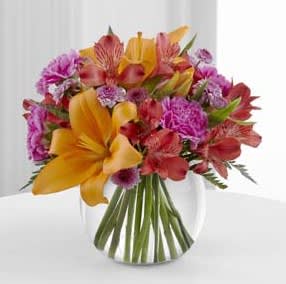 Light Of My Life - 6 in. Glass Bubble Bowl with Alstroemeria, Carnation, Asiatic Lily, and Button Pom Height:10in x Width:10in